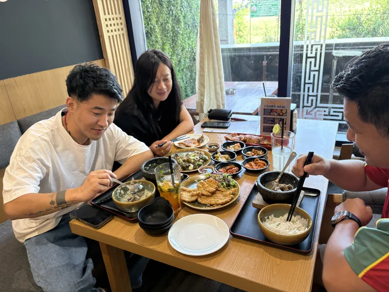 Four friends, one long table